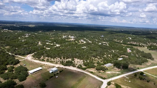 a view of a back yard of a house