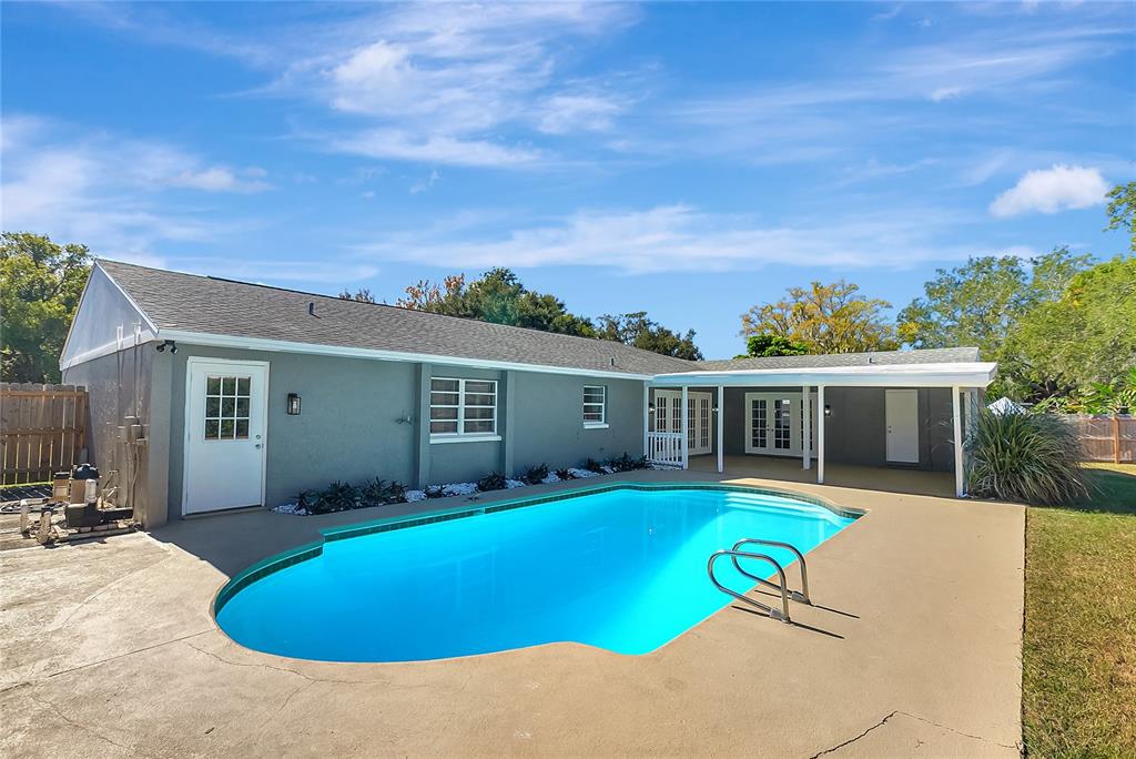114 Barkfield Street Brandon, FL 33511 - Photo 2 of 59 a view of a house with swimming pool