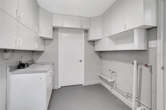 a bathroom with a sink and mirror