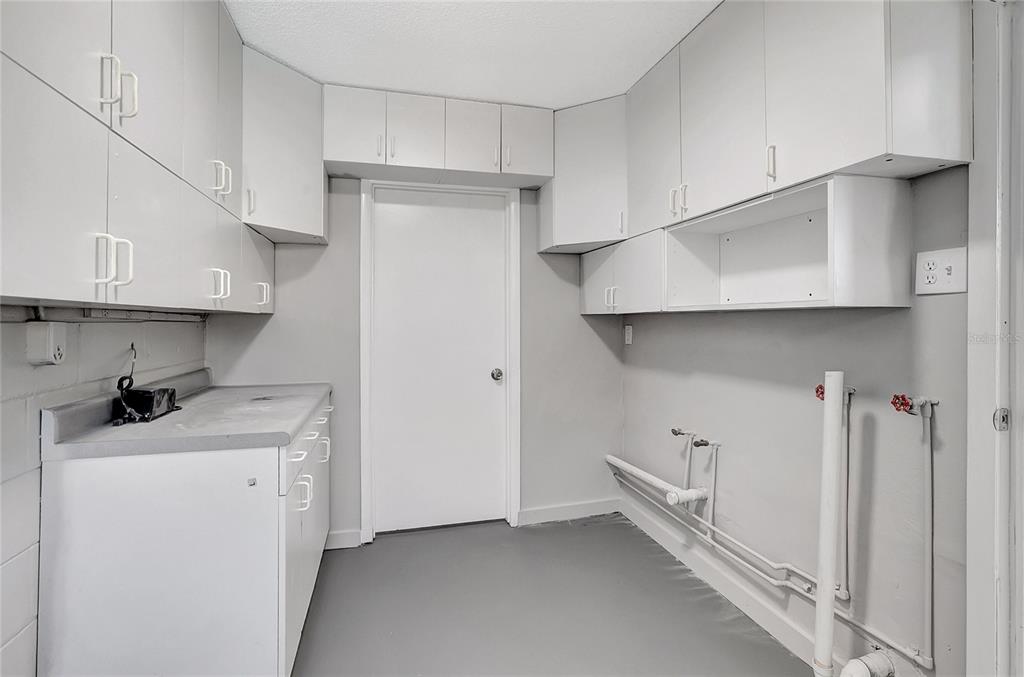 114 Barkfield Street Brandon, FL 33511 - Photo 29 of 59 a kitchen with a stove and a refrigerator