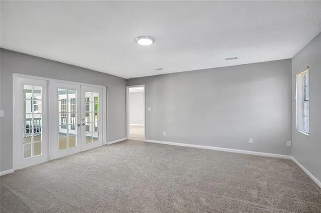 a bathroom with a double vanity sink mirror and