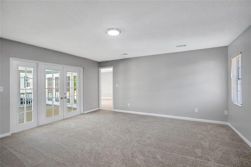 114 Barkfield Street Brandon, FL 33511 - Photo 34 of 59 a view of an empty room with a window