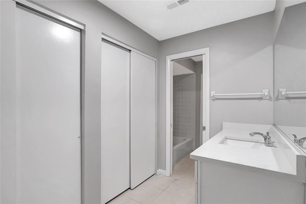 114 Barkfield Street Brandon, FL 33511 - Photo 35 of 59 a bathroom with a sink and mirror