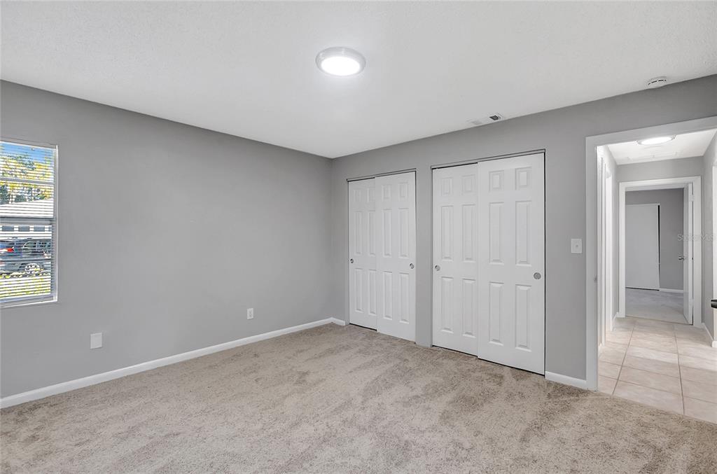 114 Barkfield Street Brandon, FL 33511 - Photo 40 of 59 a view of an empty room and a window