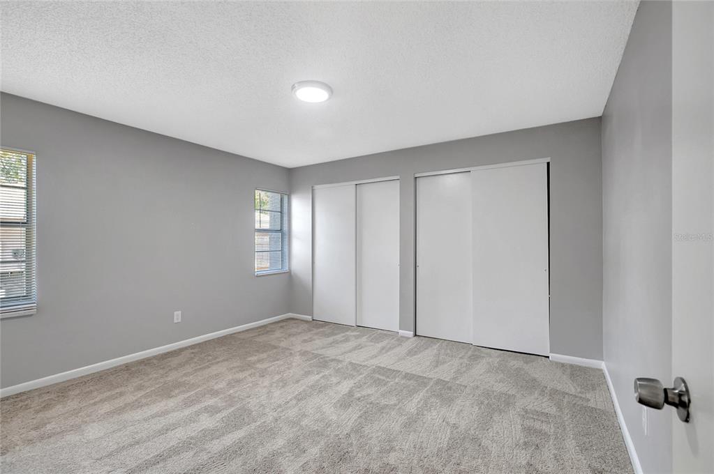 114 Barkfield Street Brandon, FL 33511 - Photo 44 of 59 a view of an empty room with windows