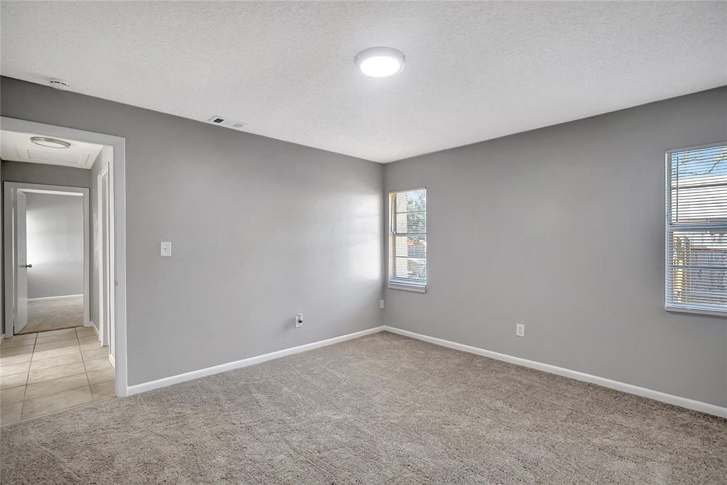 114 Barkfield Street Brandon, FL 33511 - Photo 46 of 59 a view of an empty room with a window