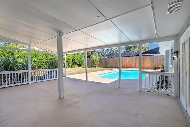 a front view of a house with a garden and outdoor space