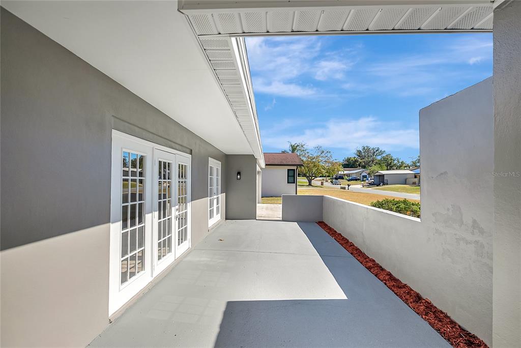 114 Barkfield Street Brandon, FL 33511 - Photo 7 of 59 a view of a living room with a large window