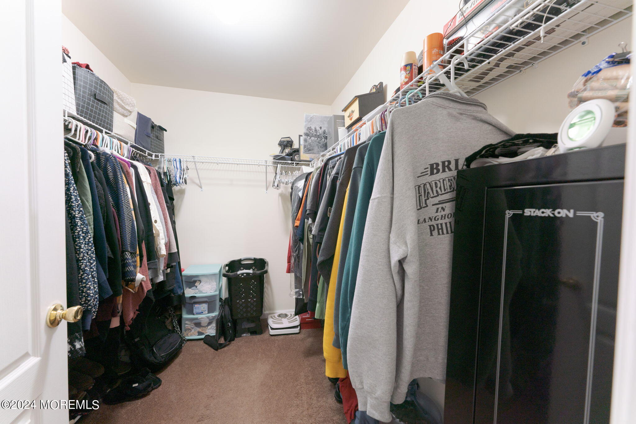 83 Gunning River Road Barnegat, NJ 08005 - Photo 14 of 24 a view of walk in closet with clothes and shoes