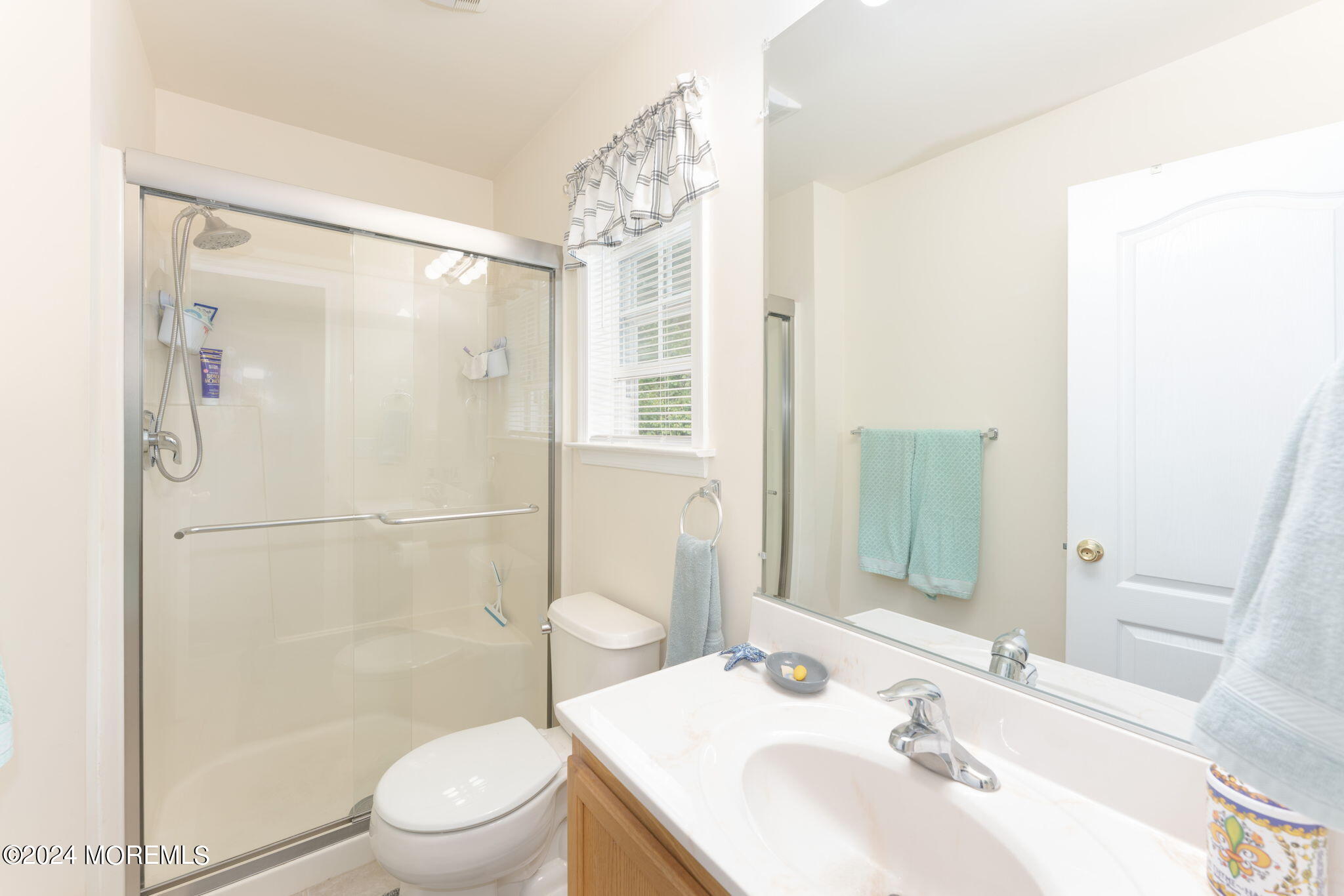 83 Gunning River Road Barnegat, NJ 08005 - Photo 15 of 24 a bathroom with a sink toilet and shower