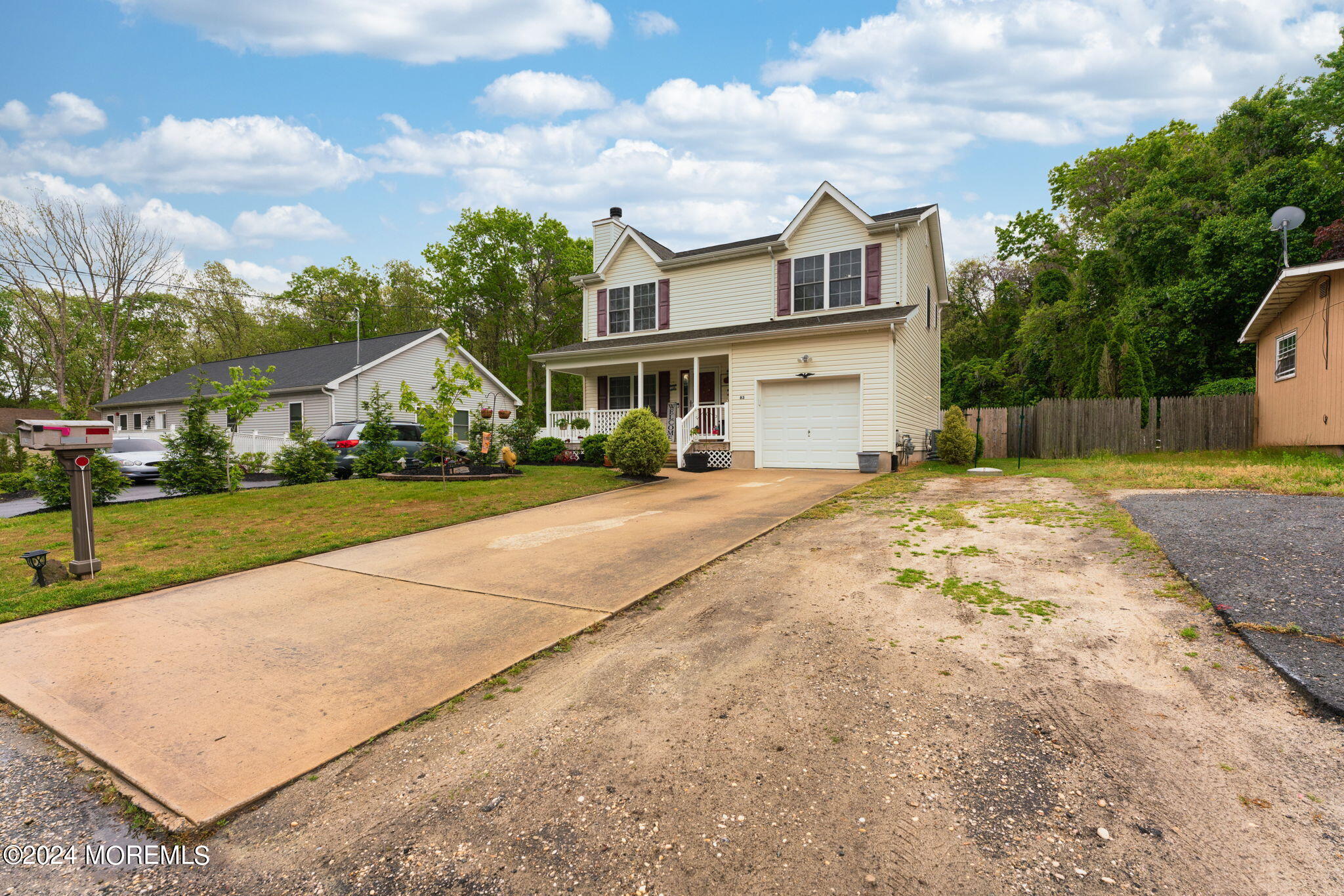 83 Gunning River Road Barnegat, NJ 08005 - Photo 24 of 24 a front view of house with yard and green space