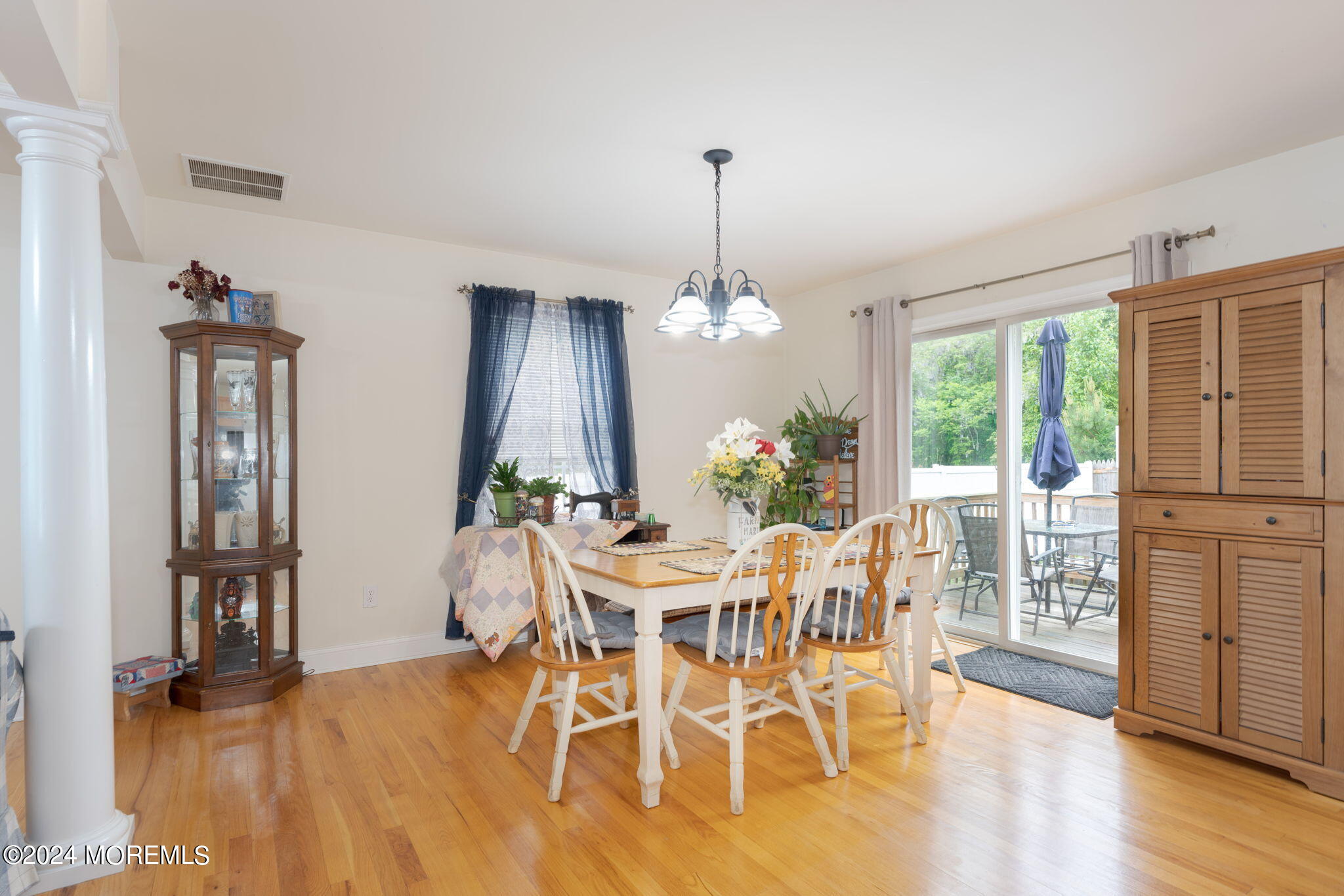 83 Gunning River Road Barnegat, NJ 08005 - Photo 8 of 24 a view of a dining room with furniture window and wooden floor