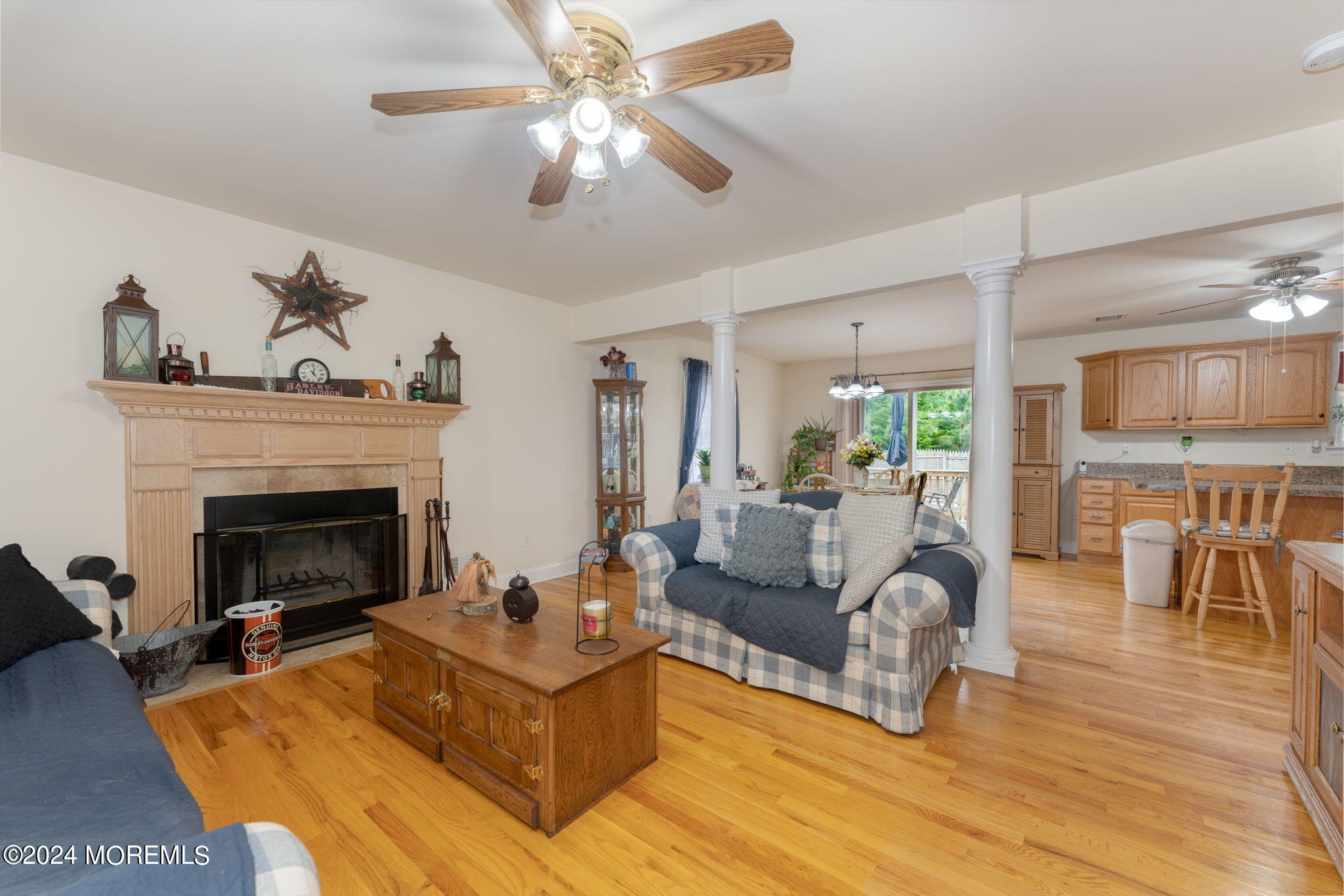 83 Gunning River Road Barnegat, NJ 08005 - Photo 9 of 24 a living room with furniture and a fireplace