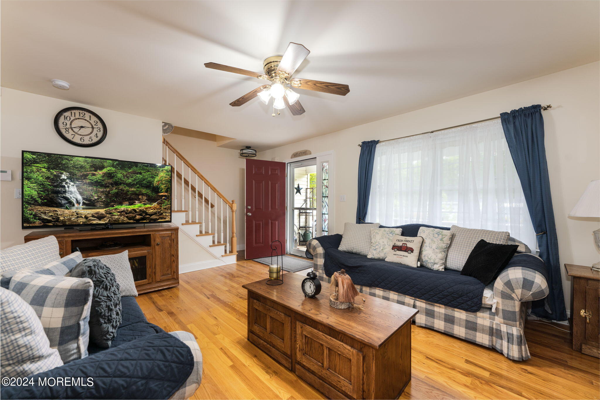 83 Gunning River Road Barnegat, NJ 08005 - Photo 10 of 24 a living room with furniture and a large window