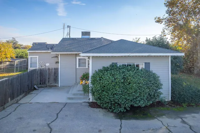 front view of a house with a small yard