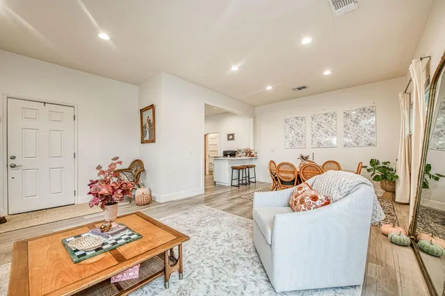 a living room with furniture and a couch