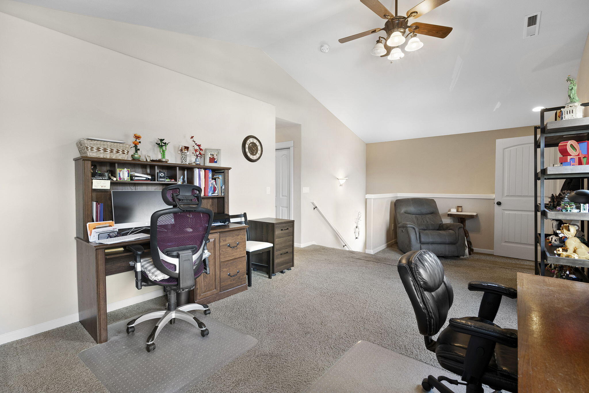 62906 Bilyeu Way Bend, OR 97701 - Photo 19 of 100 a view of a workspace with furniture and a window