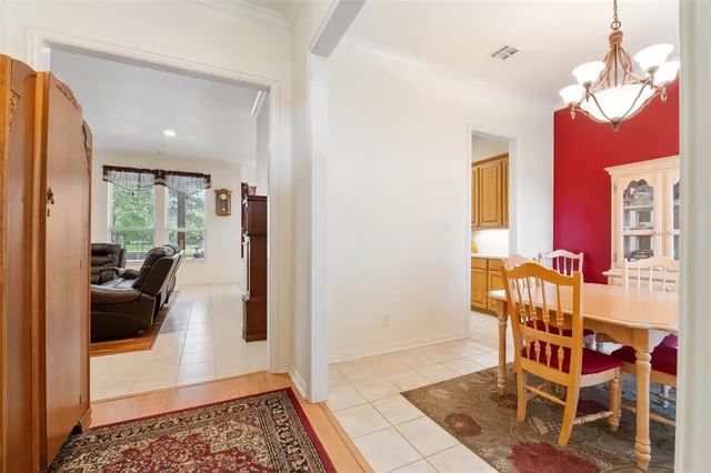 a view of workspace with wooden floor and windows