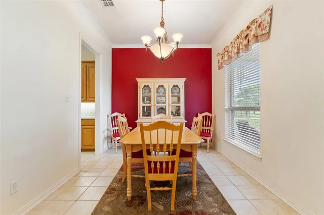 a utility room with sink dryer and washer