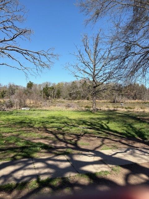 18436 County Road 331 Terrell, TX 75161 - Photo 9 of 10 a view of a field with an trees