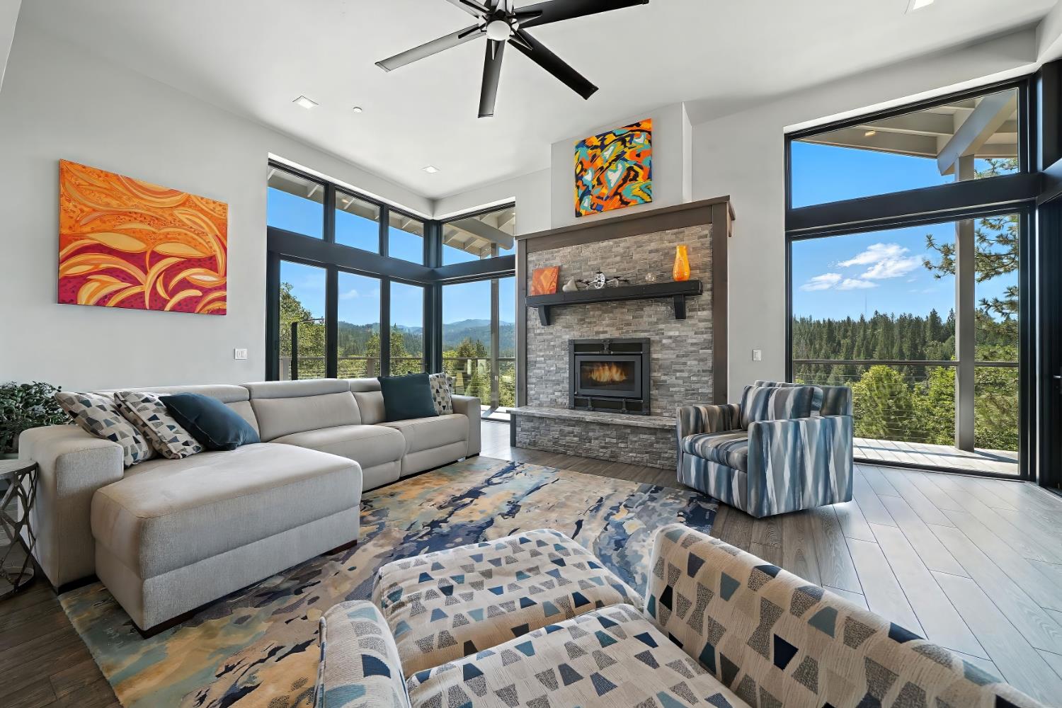 7401 Schaad Road Wilseyville, CA 95257 - Photo 16 of 76 a living room with furniture large window and a fireplace