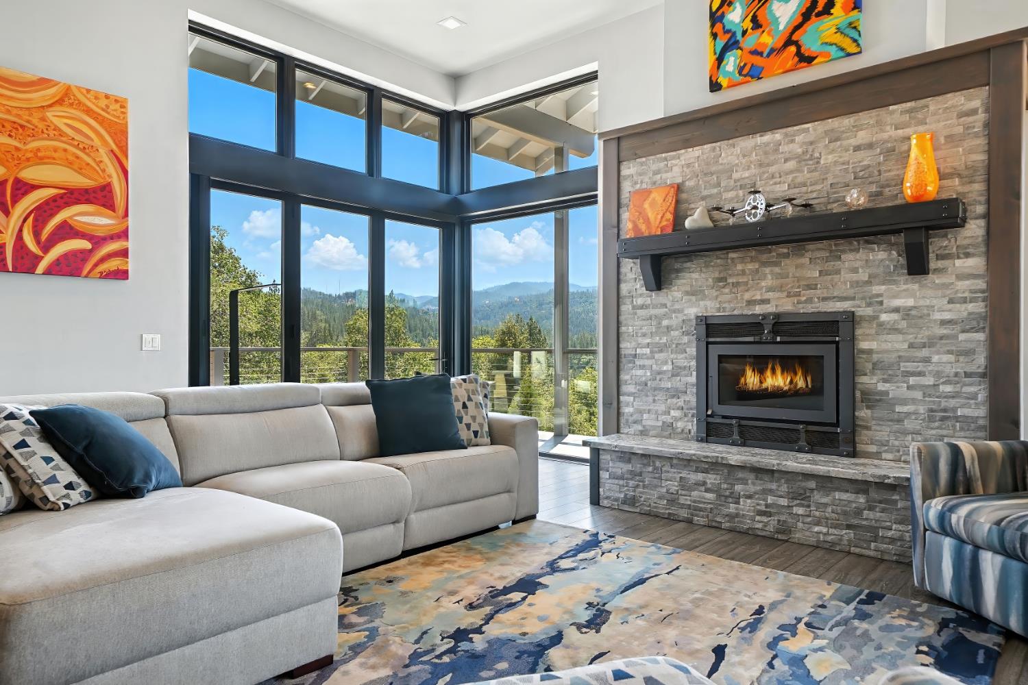 7401 Schaad Road Wilseyville, CA 95257 - Photo 17 of 76 a living room with furniture a fireplace and a flat screen tv
