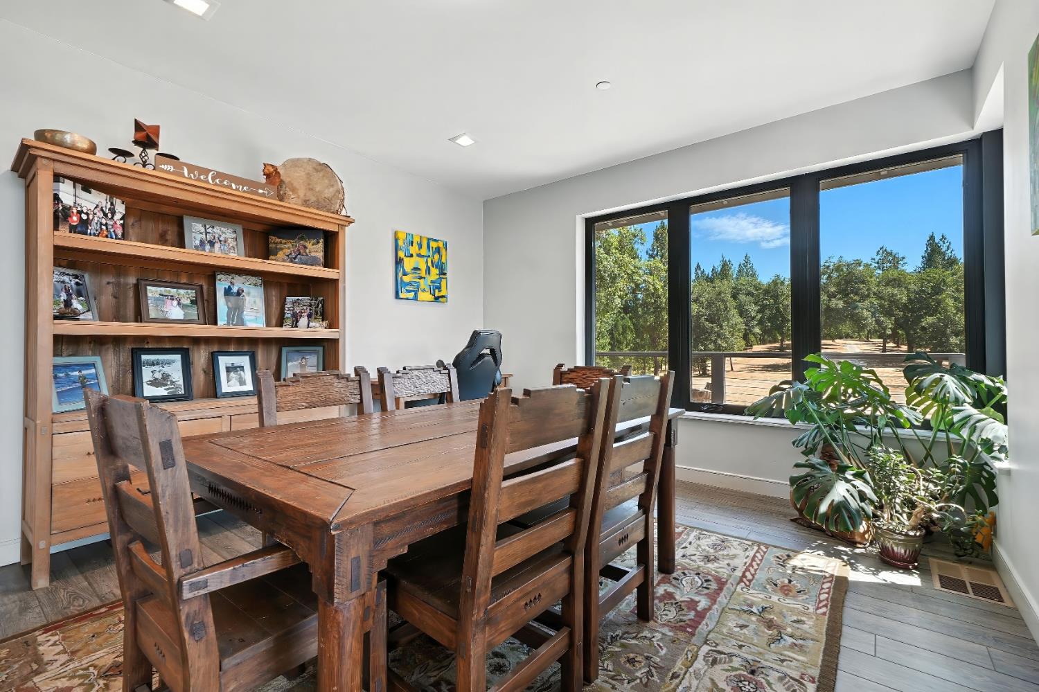 7401 Schaad Road Wilseyville, CA 95257 - Photo 19 of 76 a view of a dining room with furniture window and wooden floor