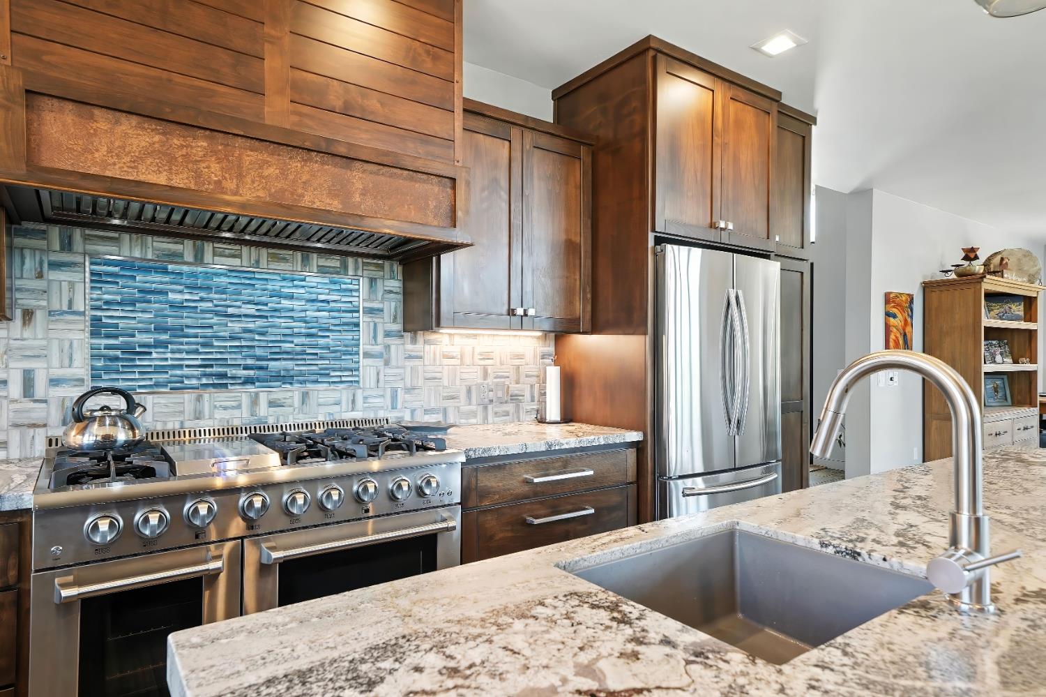 7401 Schaad Road Wilseyville, CA 95257 - Photo 28 of 76 a kitchen with stainless steel appliances granite countertop a stove a refrigerator and a stove