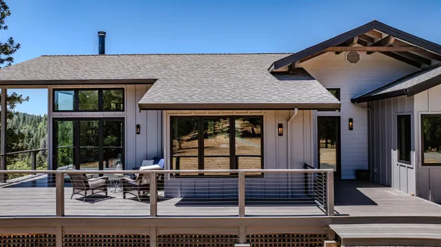 a view of a terrace with seating area