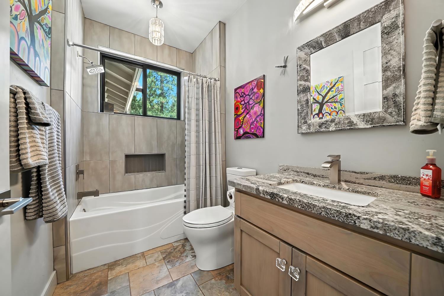 7401 Schaad Road Wilseyville, CA 95257 - Photo 40 of 76 a bathroom with a granite countertop sink a toilet and a bathtub