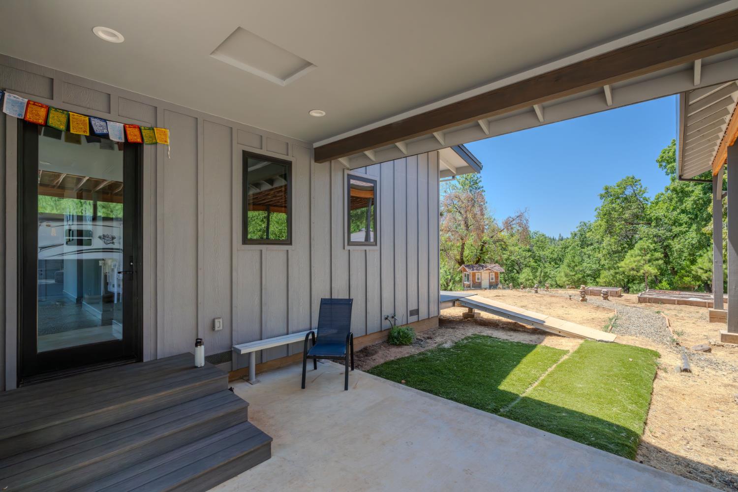 7401 Schaad Road Wilseyville, CA 95257 - Photo 44 of 76 a backyard of a house with yard and outdoor seating