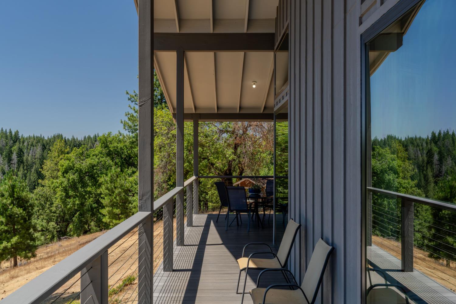 7401 Schaad Road Wilseyville, CA 95257 - Photo 50 of 76 a view of a balcony with chair and wooden floor
