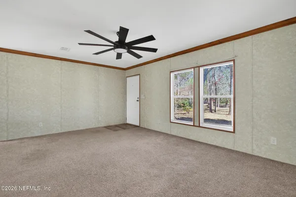 an empty room with windows