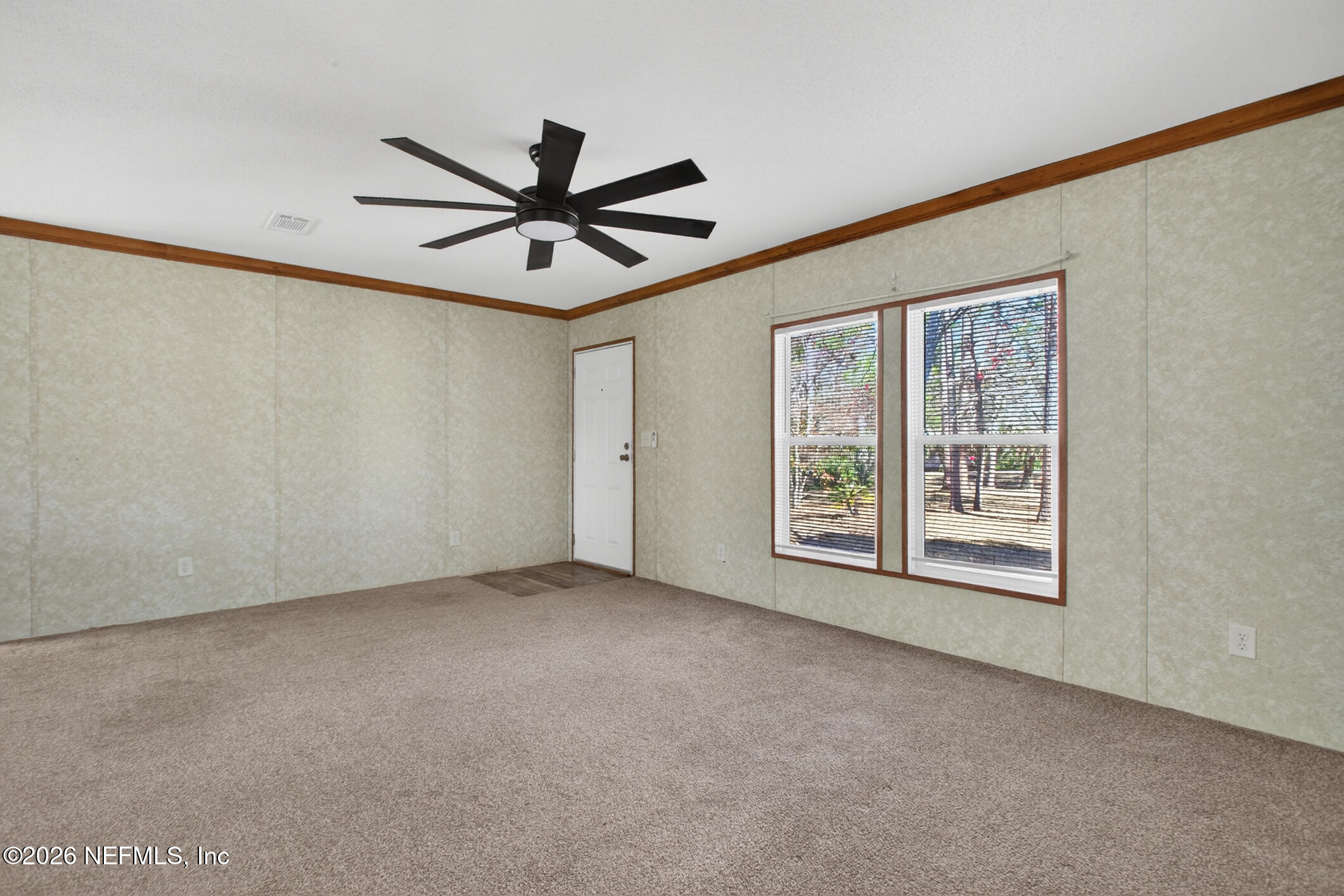 69 Azalea Avenue Middleburg, FL 32068 - Photo 14 of 41 a view of an empty room with a window