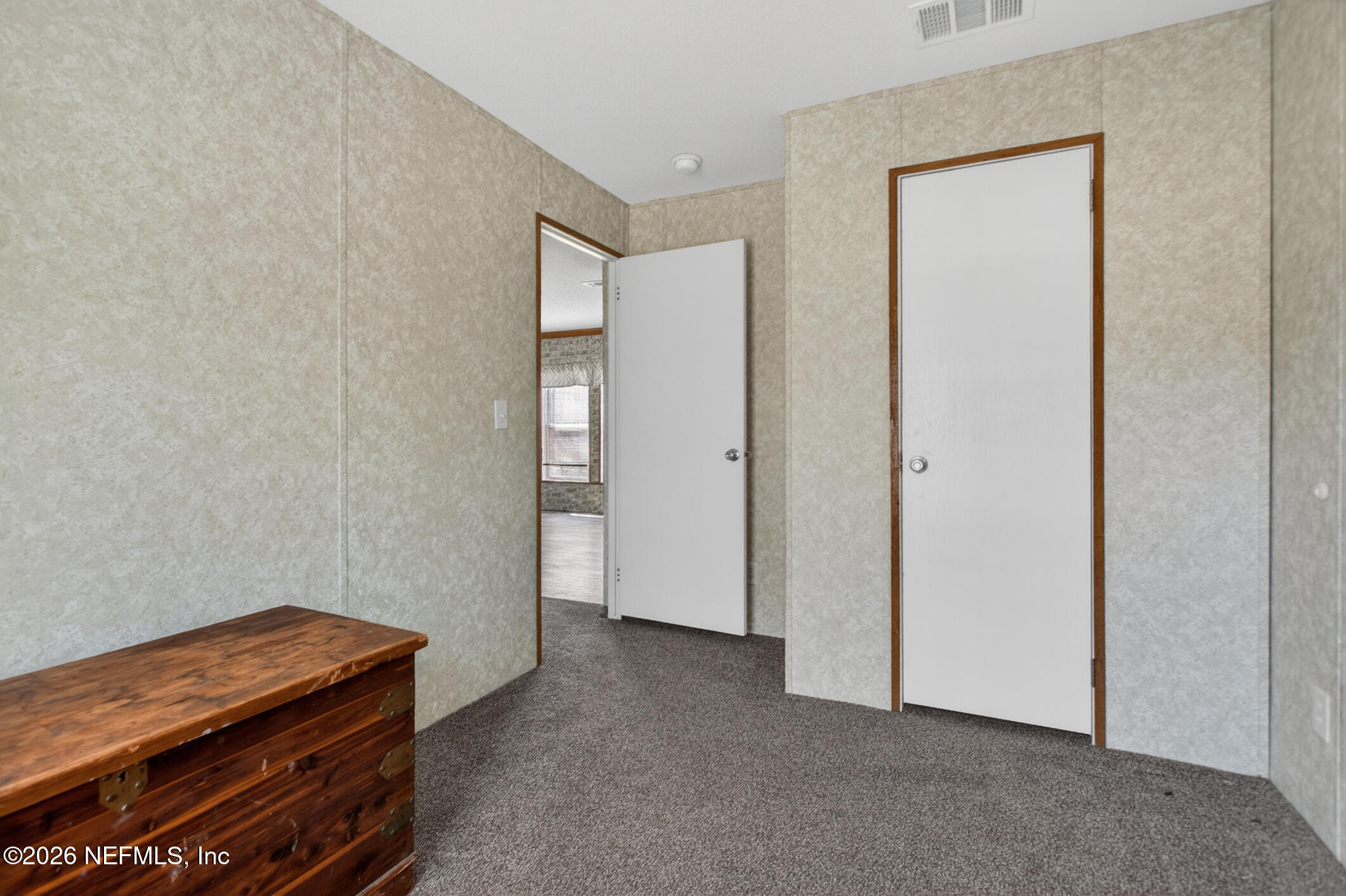 69 Azalea Avenue Middleburg, FL 32068 - Photo 22 of 41 a room with a bunk bed and a dresser