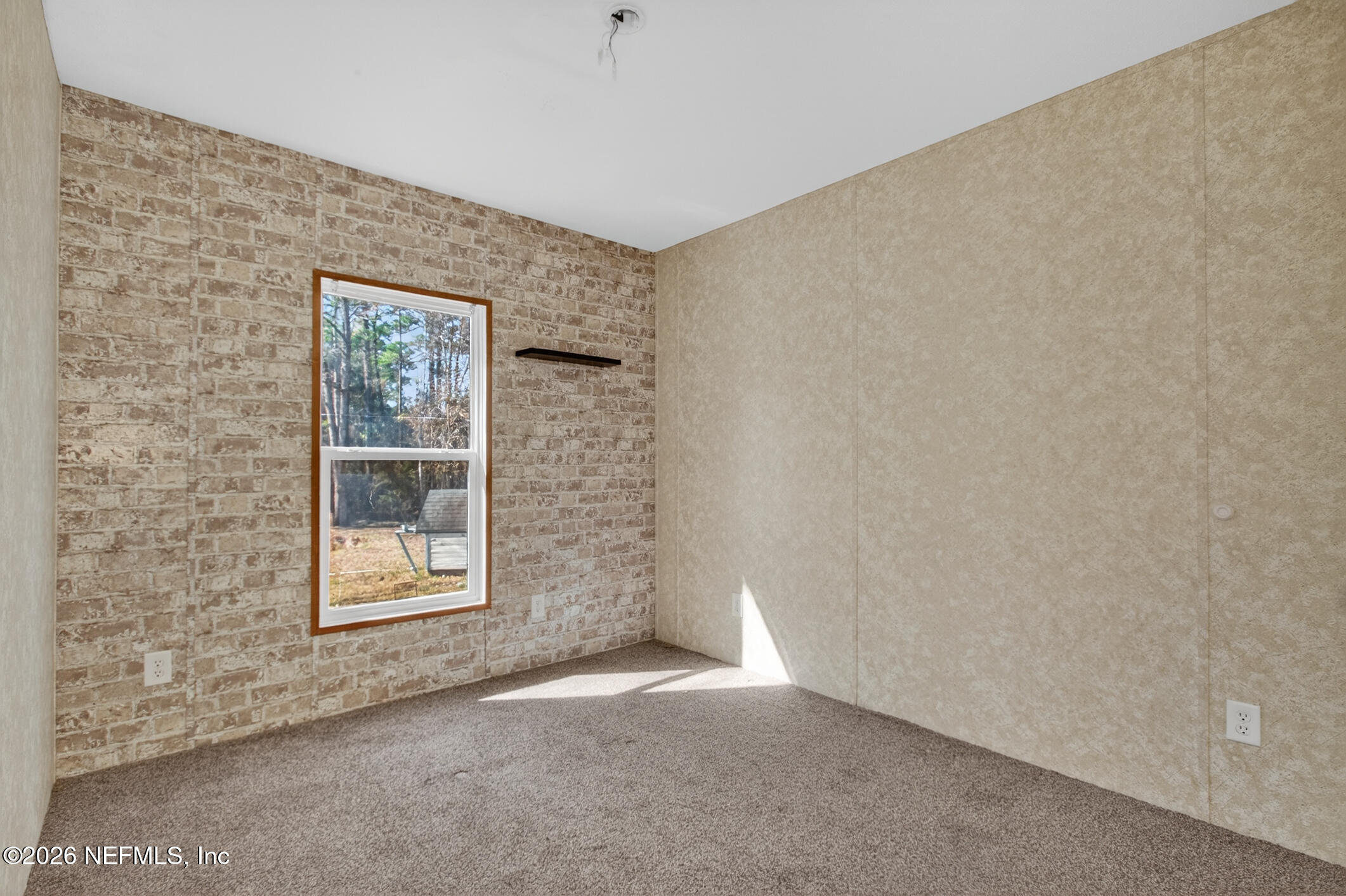 69 Azalea Avenue Middleburg, FL 32068 - Photo 26 of 41 an empty room with windows