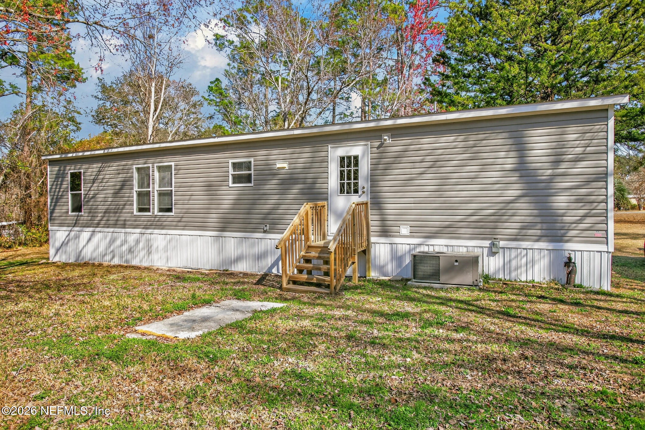 69 Azalea Avenue Middleburg, FL 32068 - Photo 29 of 41 a view of a house with backyard