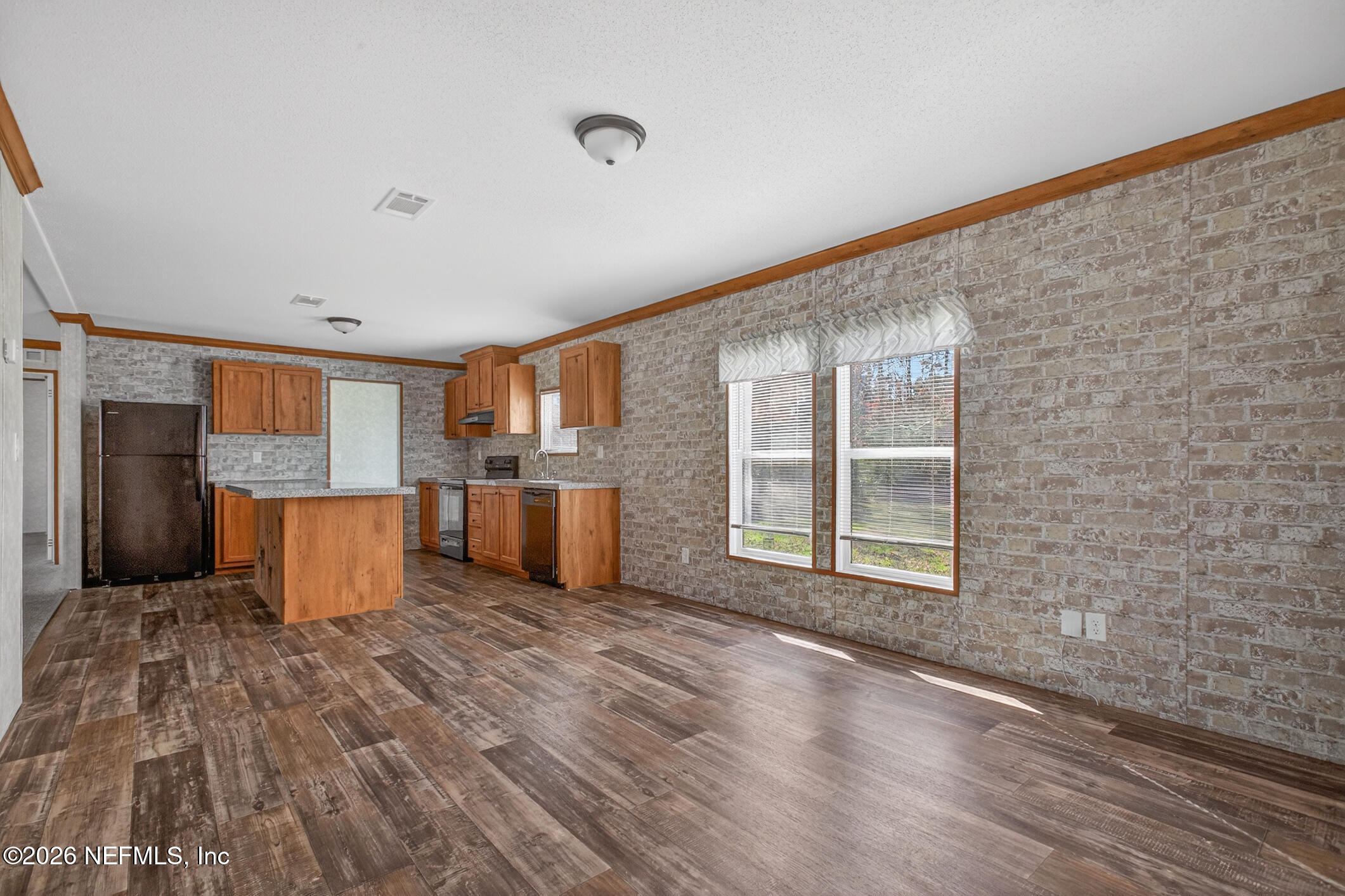 69 Azalea Avenue Middleburg, FL 32068 - Photo 10 of 41 a view of a kitchen with a sink and cabinets