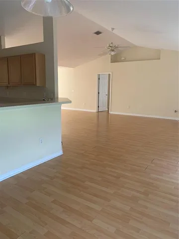 a view of a room with an empty space