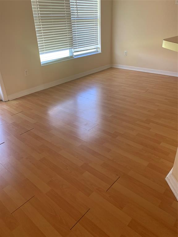 3190 Southwest Curcuma Street Port St. Lucie, FL 34953 - Photo 7 of 19 a view of an empty room with a window