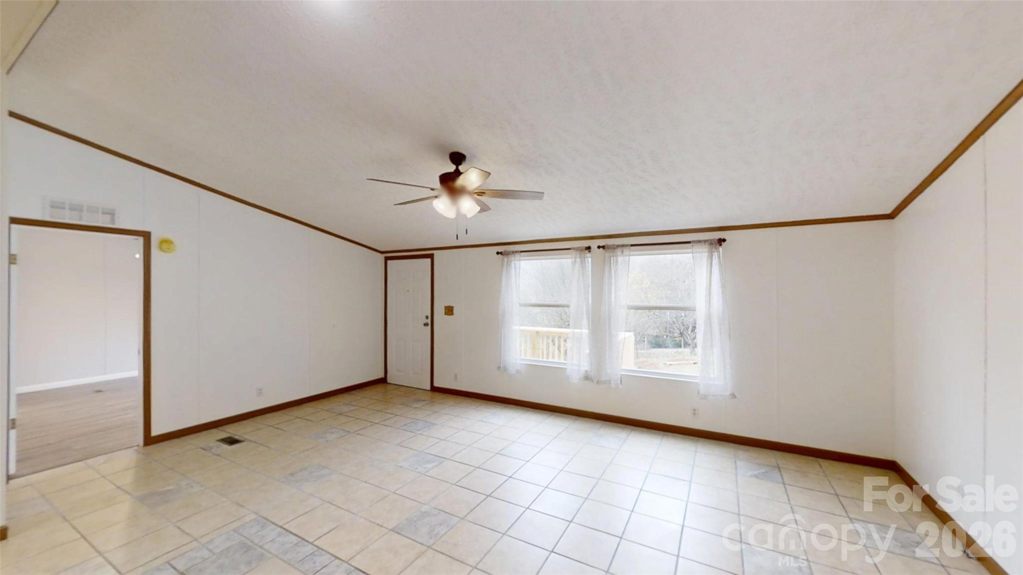 71 London Lane Clyde, NC 28721 - Photo 14 of 33 a view of an empty room with a window