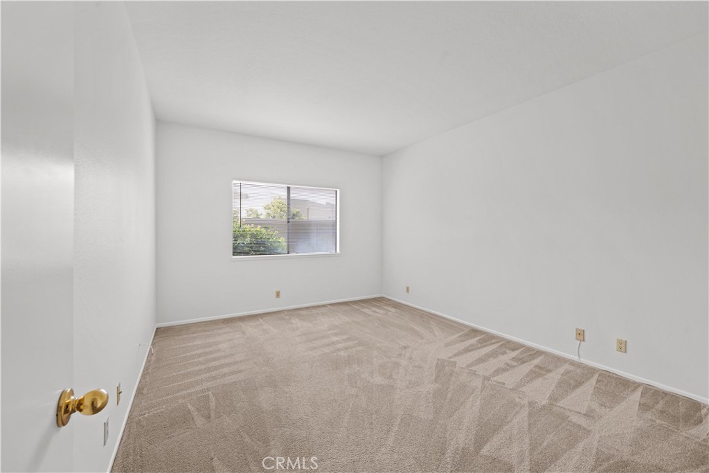 27645 Susan Beth Way, Unit A Saugus, CA 91350 - Photo 14 of 26 an empty room with windows