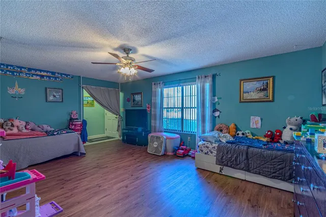 a kitchen with stainless steel appliances granite countertop a refrigerator and cabinets