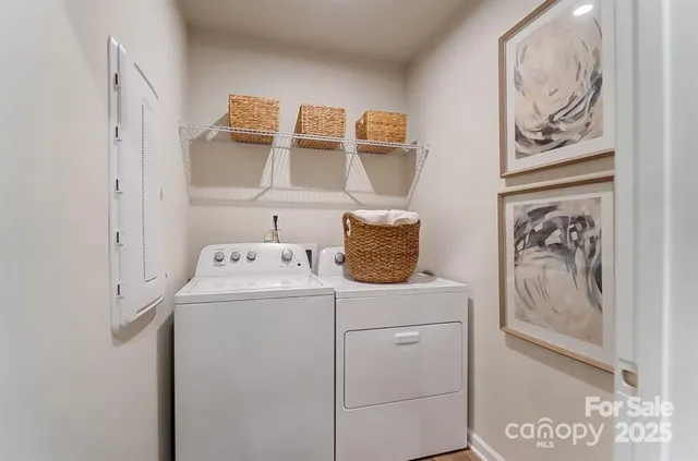 a utility room with dryer and washer
