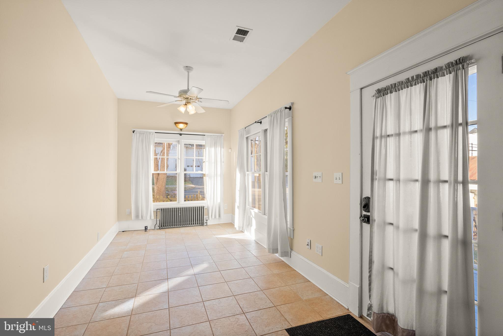 820 Locust Street Herndon, VA 20170 - Photo 17 of 55 a view of an empty room with a window