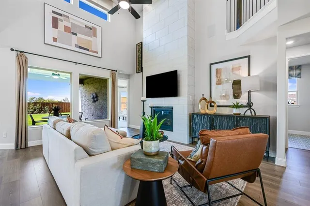 a spacious bedroom with a bed and a large window