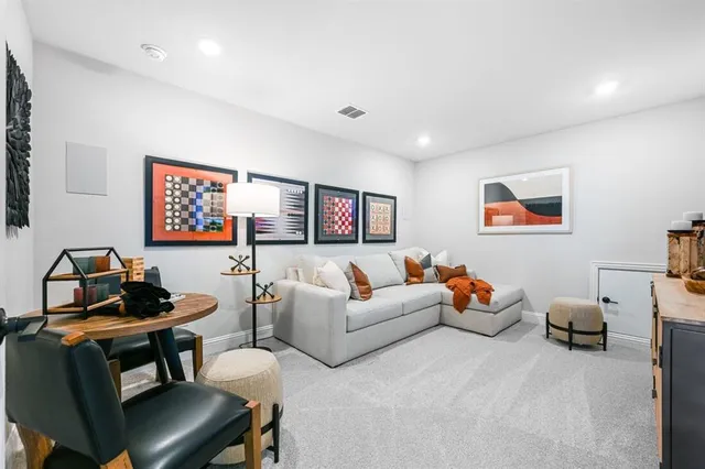 a room with gym equipment and a large window