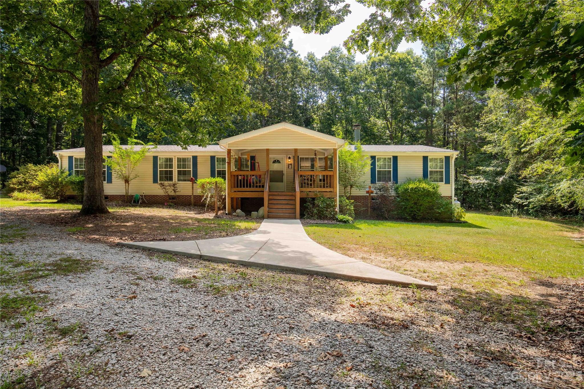 2008 Zion Road Lancaster, SC 29720 - Photo 1 of 40 a view of a house with backyard and trees