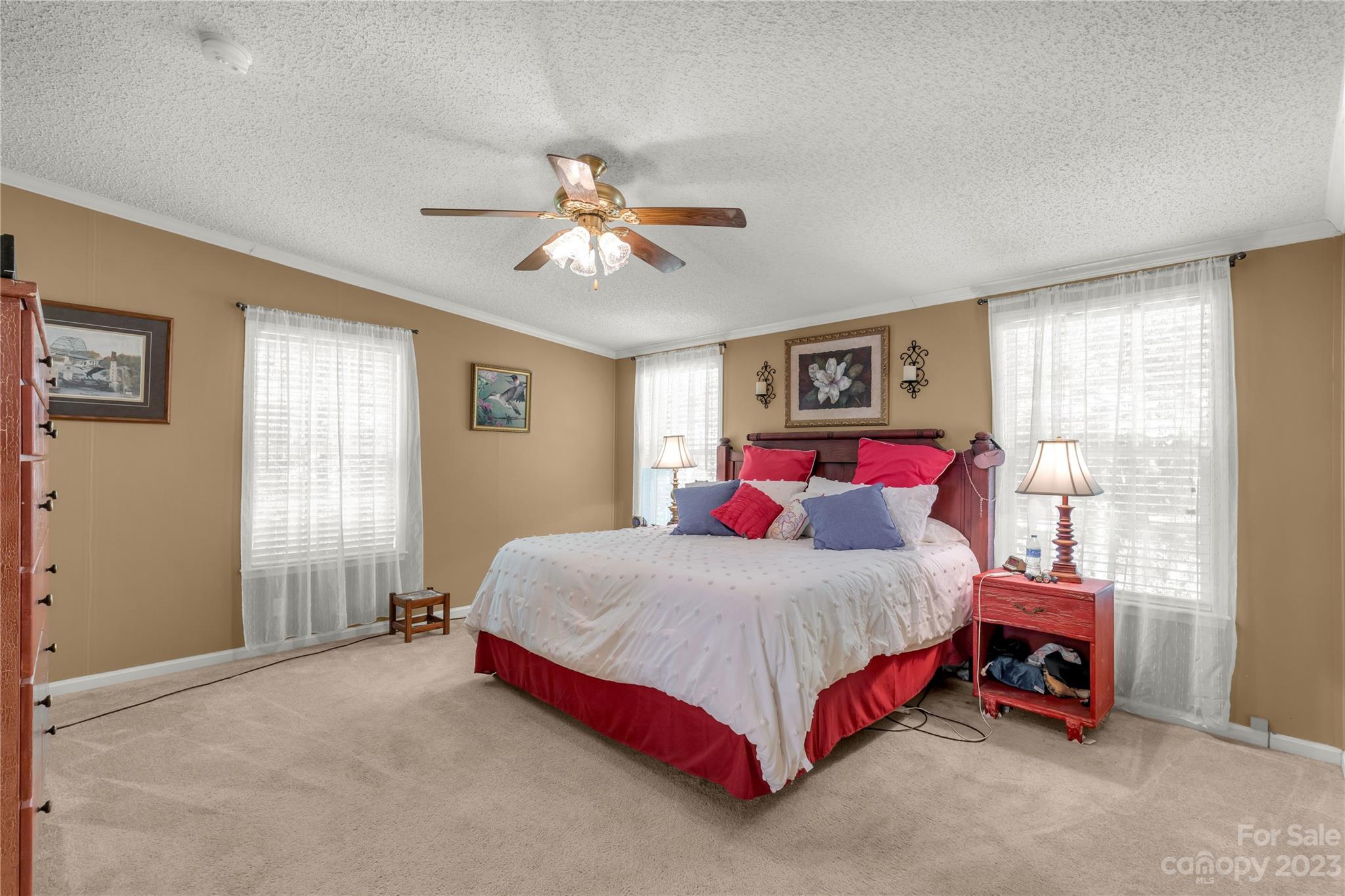 2008 Zion Road Lancaster, SC 29720 - Photo 13 of 40 a bedroom with a bed and a chandelier