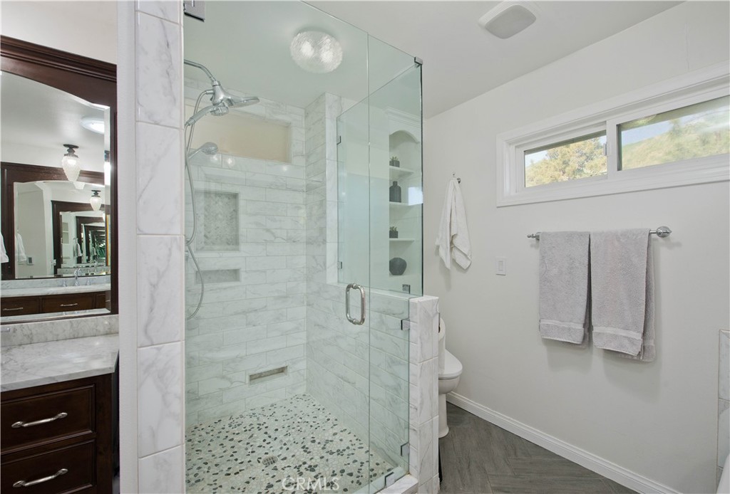 16337 Ravenglen Road Canyon Country, CA 91387 - Photo 29 of 50 a bathroom with a shower